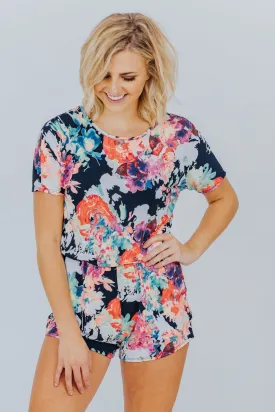 Break My Heart Short Sleeve Neon Floral Elastic Waist Romper in Black