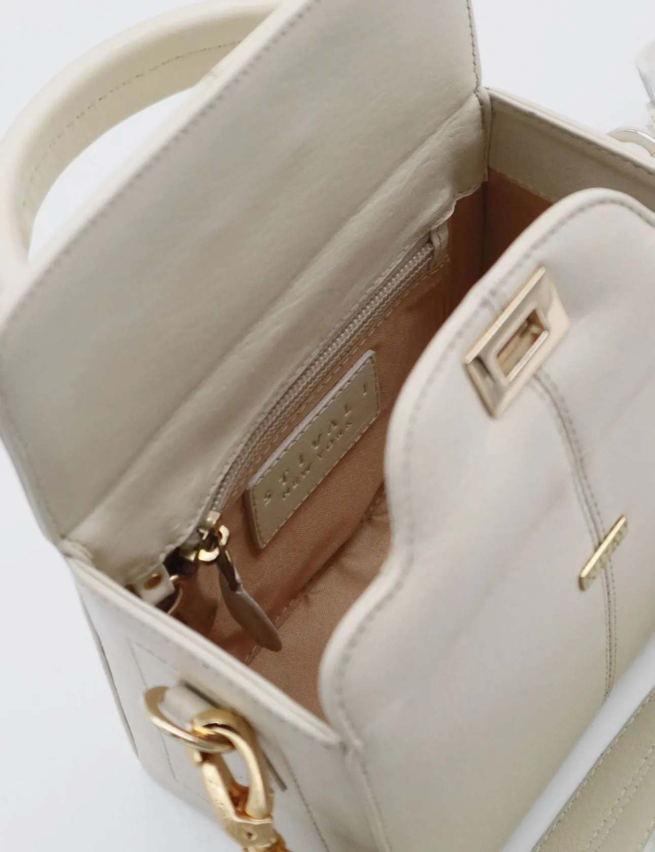 Purpose small cross body clutch in off white leather women's bag